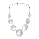 Women’s sterling silver necklace with oval and teardrop Mother of Pearl stones and Bali-inspired accents.